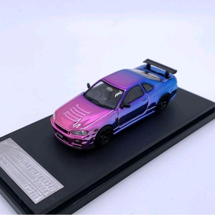 STANCE HUNTERS NISSAN SKYLINE GT-R R34 CHAMELEON CHROME DIECAST SKALA 64