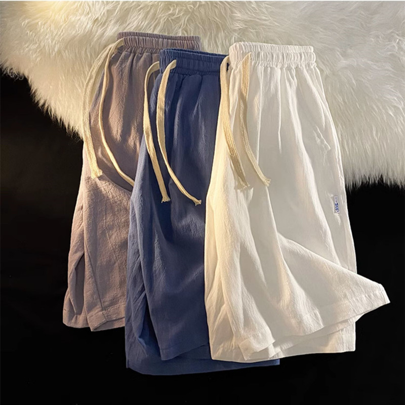 Celana pendek katun-linen pria celana kasual tipis  longgar bahan sutra es cepat kering panjang selu