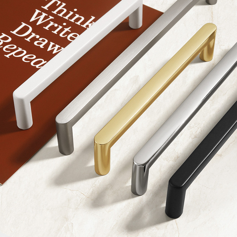 pegangan pintu lemari berwarna emas mengkilap, perak, hitam dan putih nikel, laci lemari dapur, lema