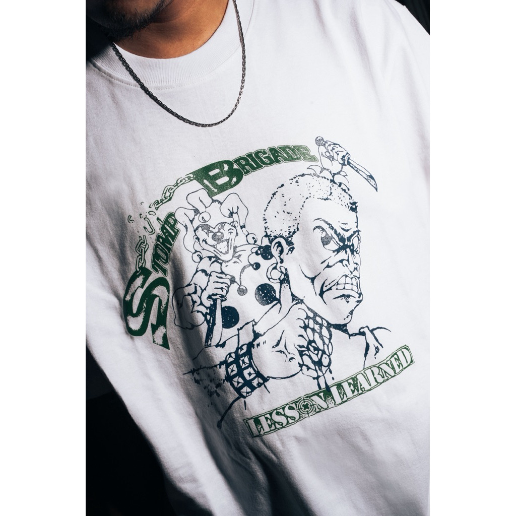 COD STOMP BRIGADE - LESSON LEARNED WHITE - Kaos Band Putih | Official Merchandise