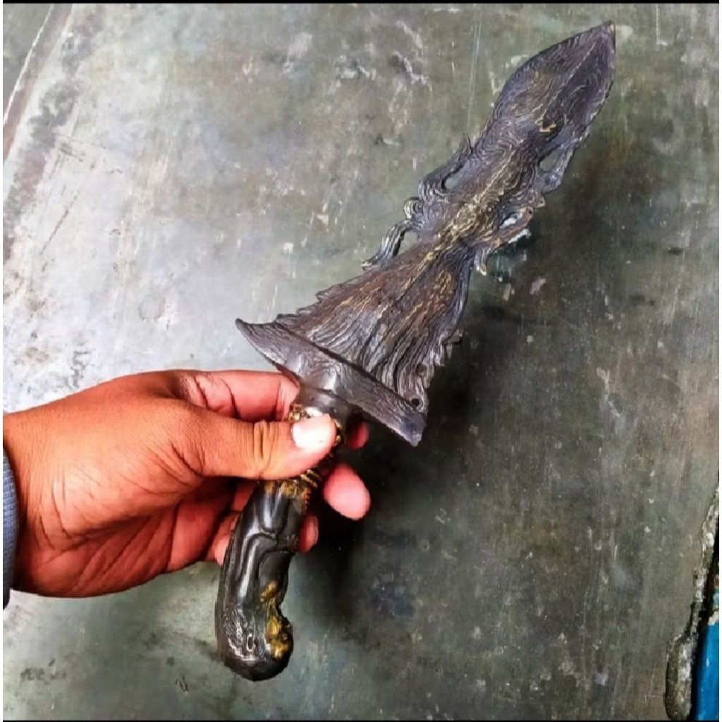 Souvenir betok kuningan hitam