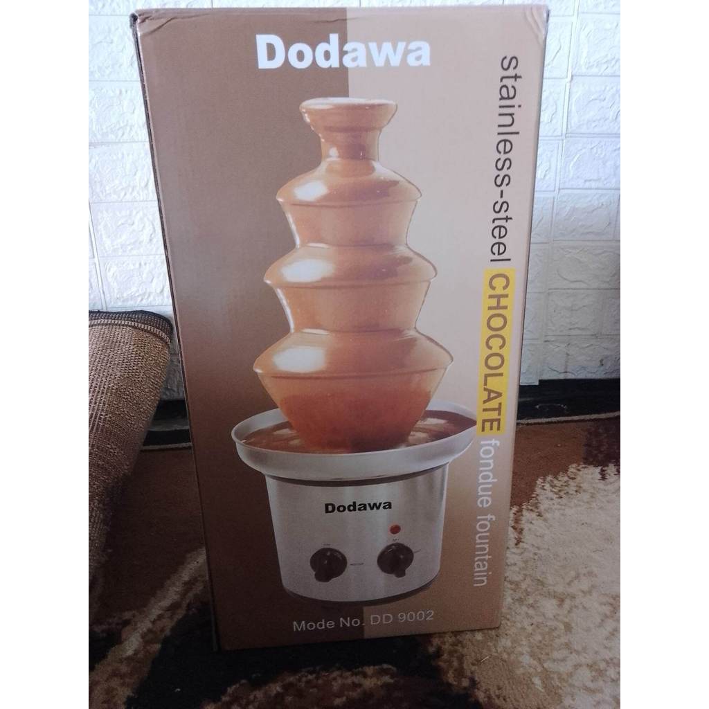 Dodawa.mesin pemancur coklat