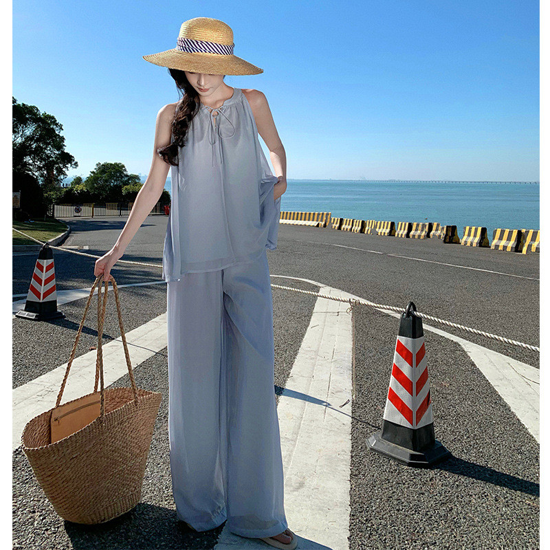 Mode Vogue Blus longgar model halter-neck untuk wanita, gaya sifon yang santai.