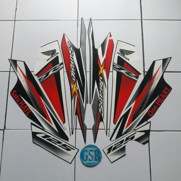 striping motor supra x 125 2013 merah LMA
