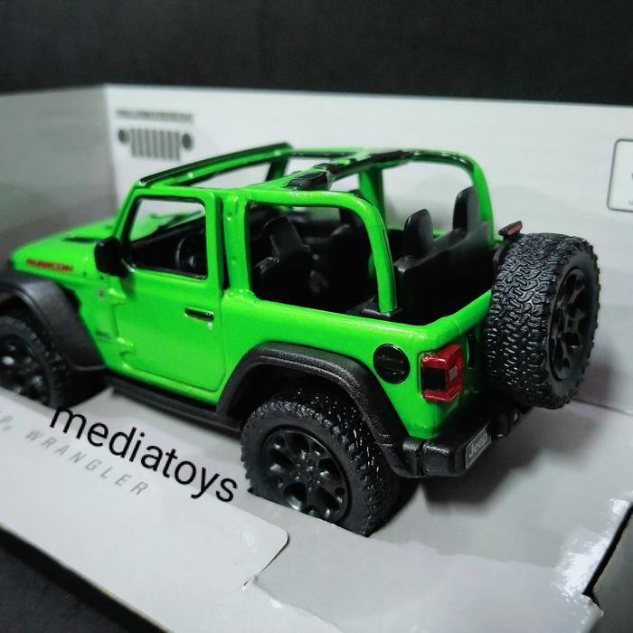diecast kinsmart jeep wrangler rubicon . hijau
