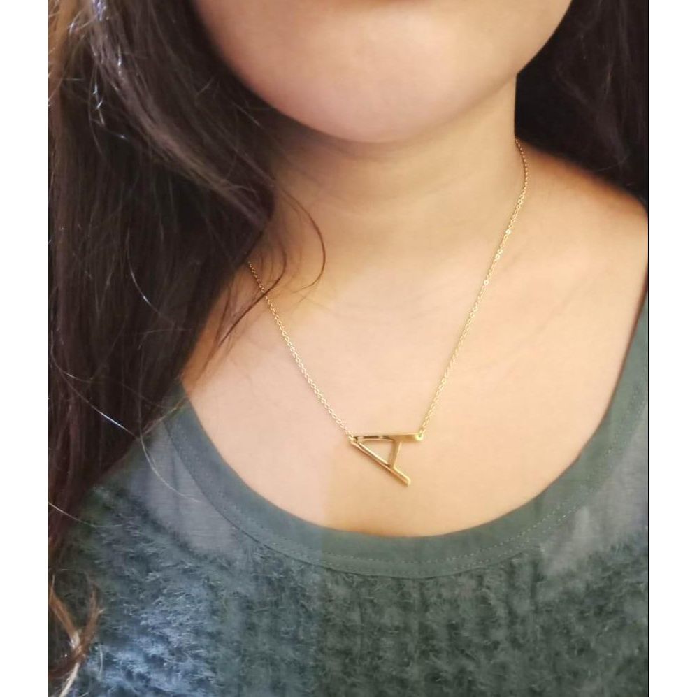 Kalung Huruf Aldabet A - Z UBS Titanium