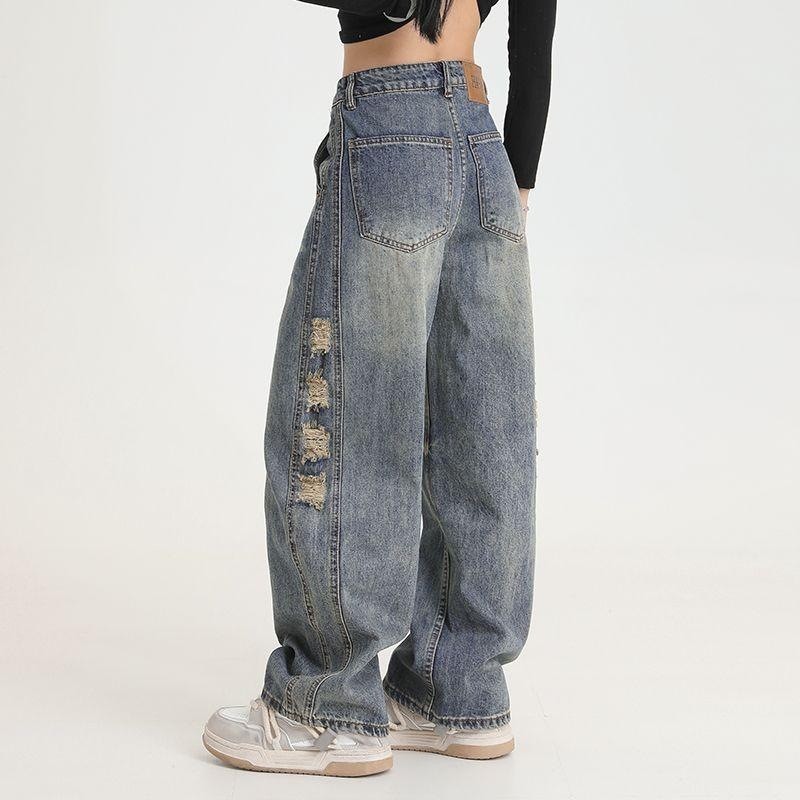 Scimitar Ripped Jeans Pria dan Wanita Amerika High Street Hip Hop Niche Wide Leg Pants