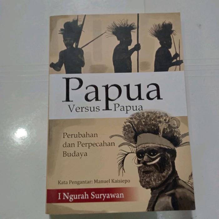 Buku PAPUA VERSUS PAPUA-I NGURAH SURYAWAN