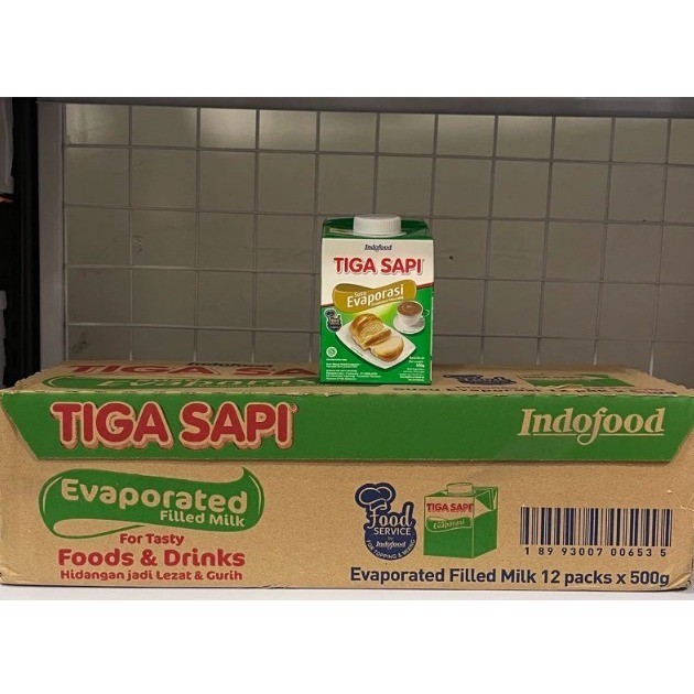 Susu Evaporasi Tiga Sapi 500 Gram 1 Dus = 12 Pcs