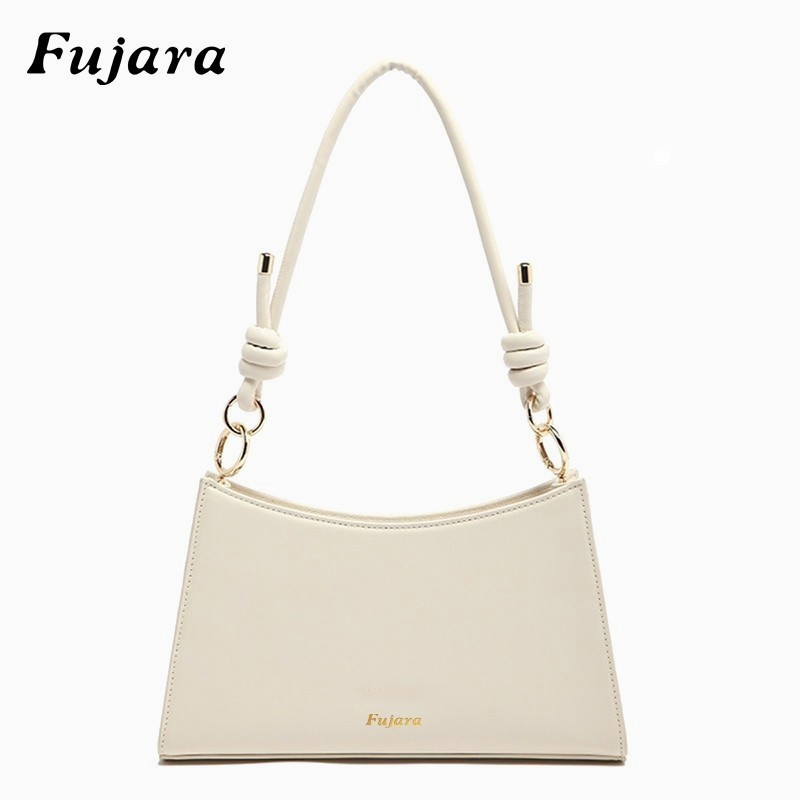 Tas Wanita Ketek: Tas Baguette Kulit dengan Desain Ramping & Elegan untuk Kantor-After-Work