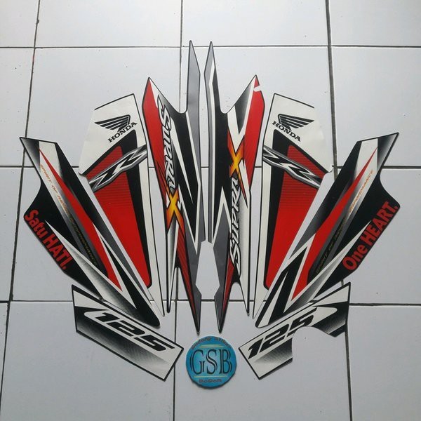 striping motor supra x 125 2013 merah LMA