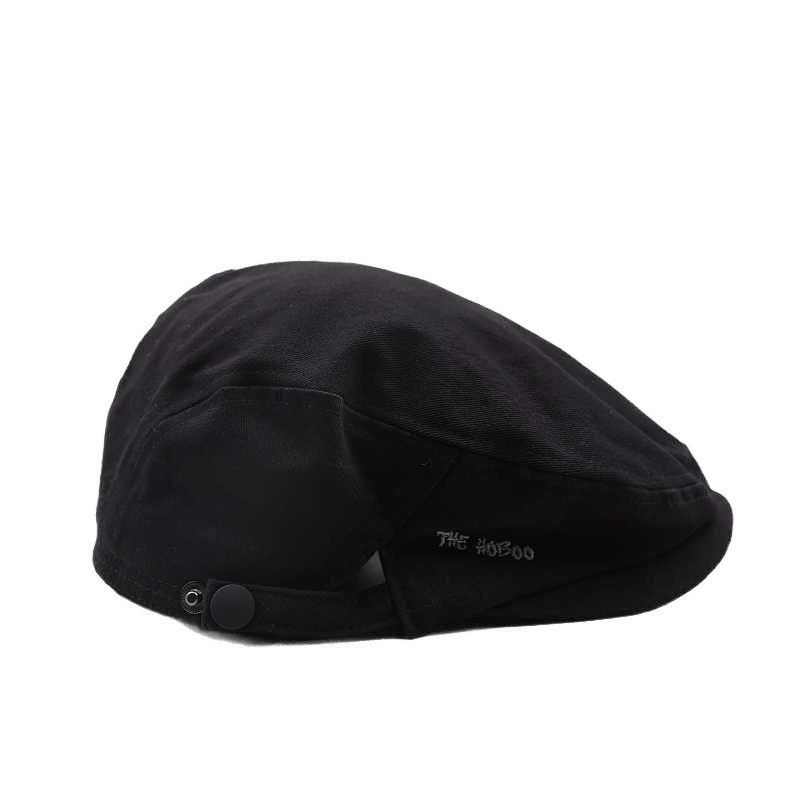 Topi newsboy retro yang trendi, topi bergaya untuk kaum muda modern.