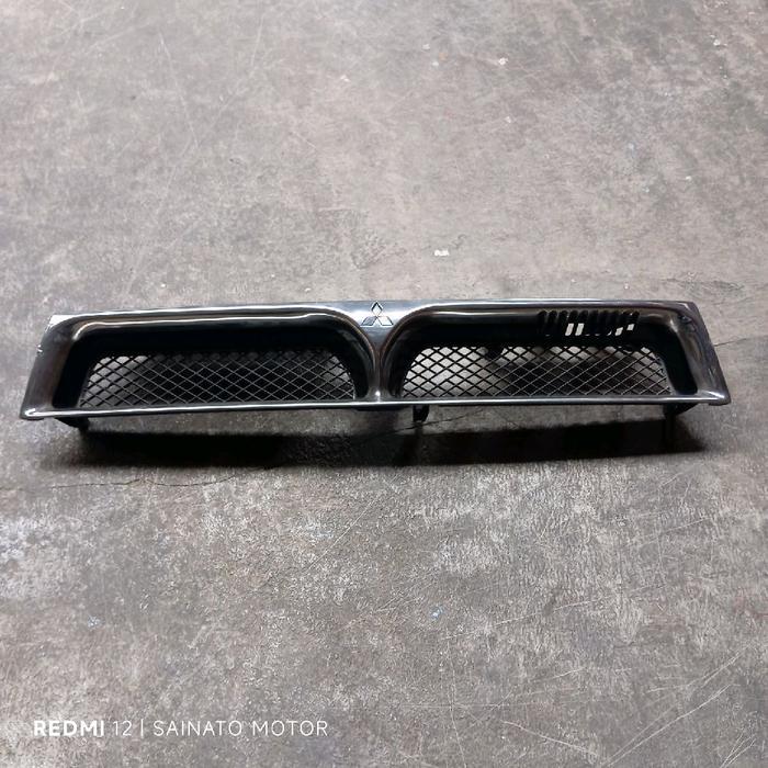 grill gril emblem logo lambang bemper depan mitsubishi galant hiu asli copotan