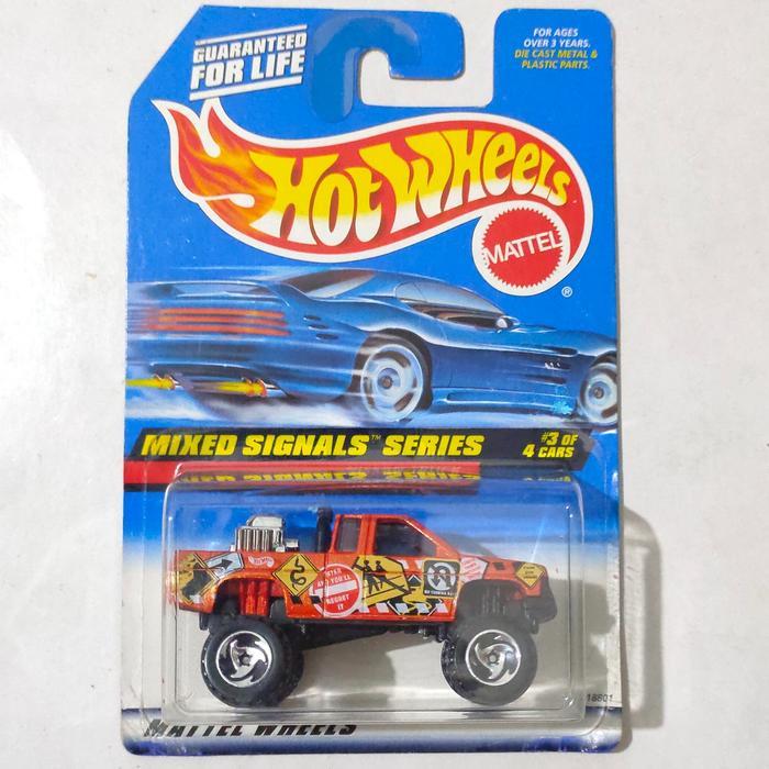 Mainan Hot Wheels Nissan Truck Hardbody orange 1998 Mixed Signals