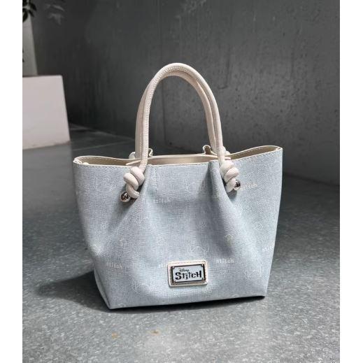 Tas saku/ tangan dengan warna biru dan putih, model denim