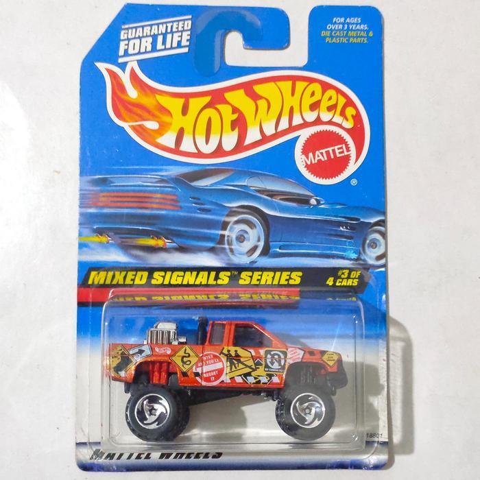 Mainan Hot Wheels Nissan Truck Hardbody orange 1998 Mixed Signals