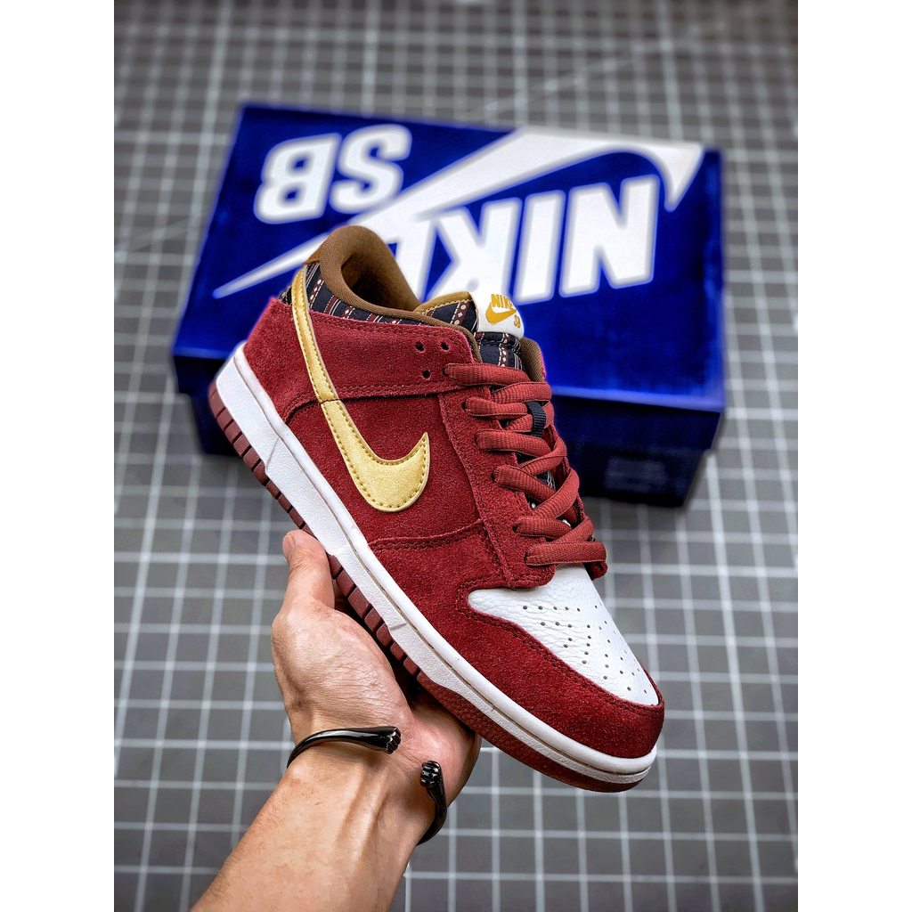 Nike SB Dunk Low City of Cinema Sepatu Skate Merah Marun Emas Retro