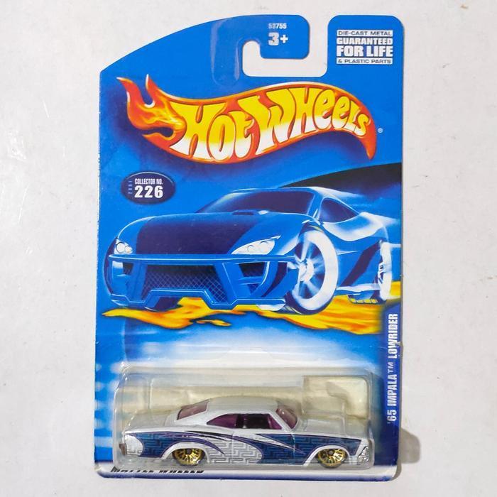 Mainan Hot Wheels 65 Chevy Impala Lowrider putih 2001