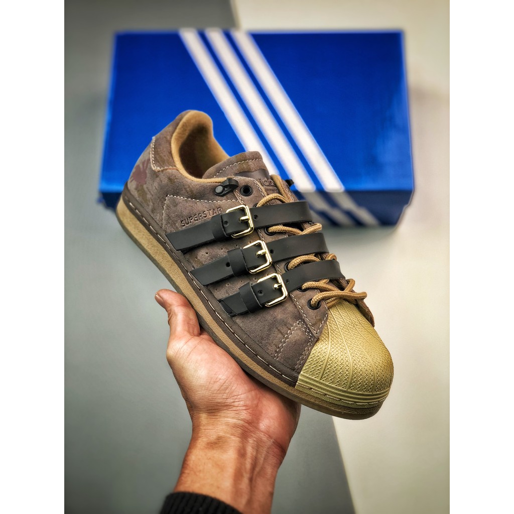 Melting Sadness 4D1D4S Originals Superatar Sepatu kasual nyaman dengan strappy shell toe berwarna co