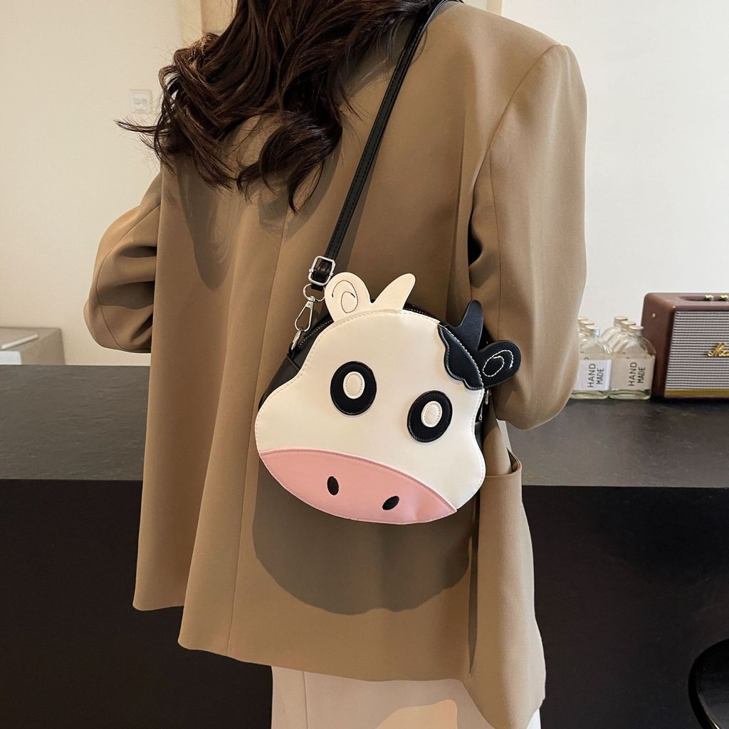 Hitam dan putih, tas sapi manis, tas bahu