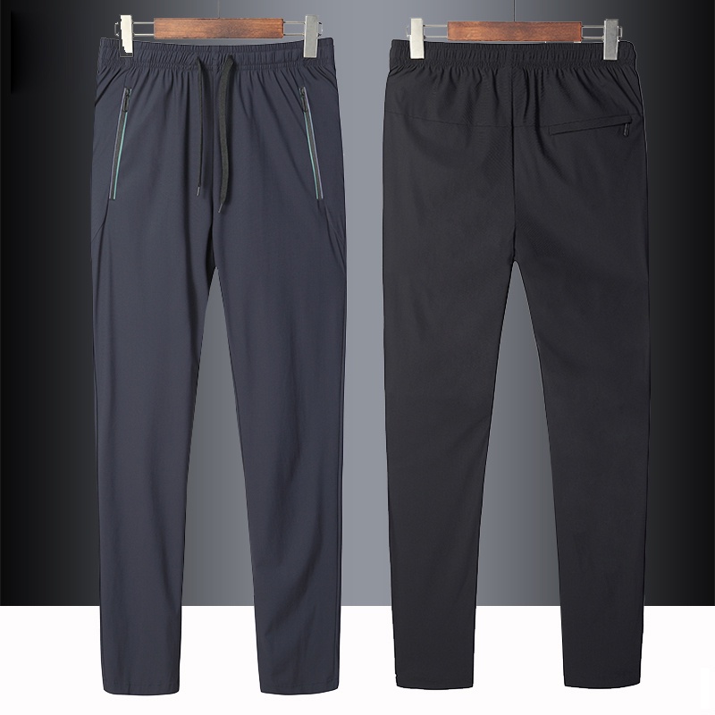 CELANA PANJANG COWO Ice Silk Sports Pants Musim panas Pria Quick Dried Ultra Thin Drawing Silk Smoot