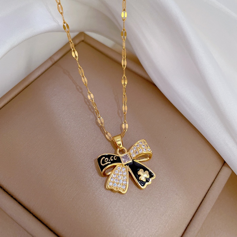 Xiaoboacc Kalung Ikatan Simpul Berlian Inlay Titanium Steel Micro Untuk Wanita Perempuan Gaya Istana Kalung Rantai Busur