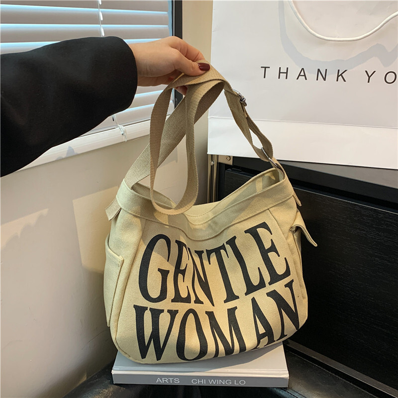 Tas Branded 2025  Warna wanita lembut menghalangi kapasitas besar secara kasual 2024 huruf baru berb