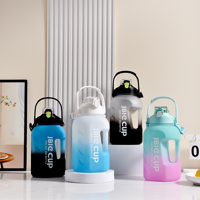 Botol Air Minum Olahraga  Baru merah grid gradien air kapasitas besar olahraga ganda minuman melompa