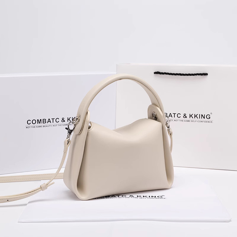COMBATC&KKING kulit kotak rokok lembut tas wanita 2024 niche baru tangan high-end kantong cross body