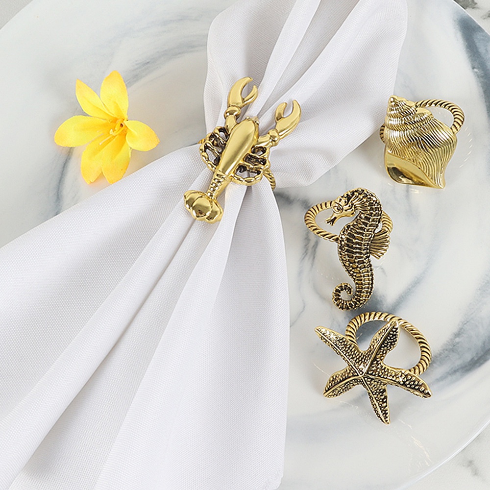Dekorasi Cantik  Cincin hidup laut baru serye napkin, buckle napkin emas, starfish, conch, seahorse,