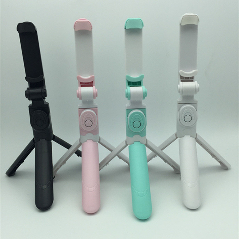 Xiongtu mobil baru stand tipe perangkat Bluetooth xt09 tripod selfie stick