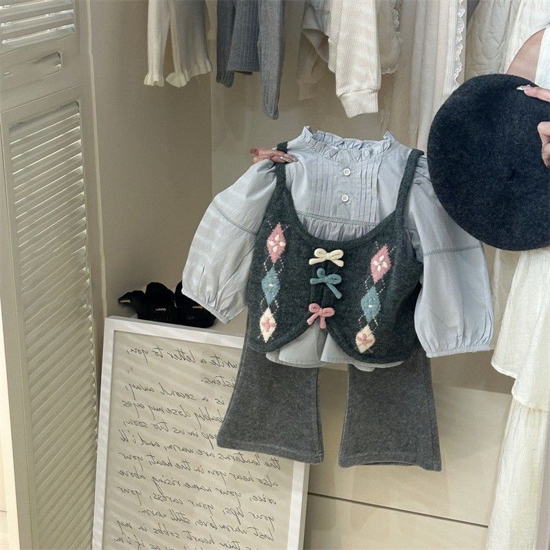 Girls 'Awal Musim Gugur 2025 Baru Versi Korea Baru Knitted Vest Baby Girl Flouser Mikro-Flare Set Ti