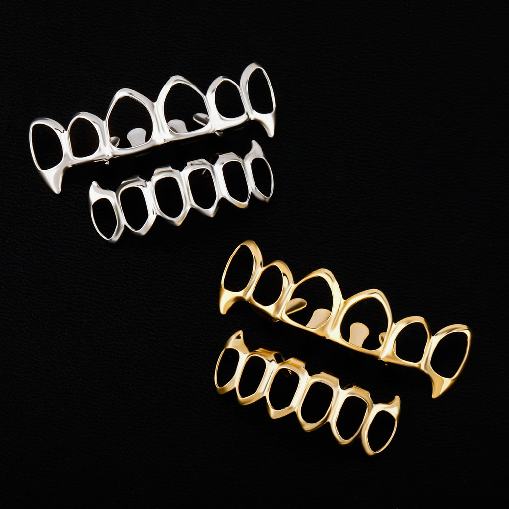 hip hop Perhiasan Jinao Taring Berongga Eropa dan Amerika Hip-Hop Trendi Gigi Emas Besar Gigi Platin