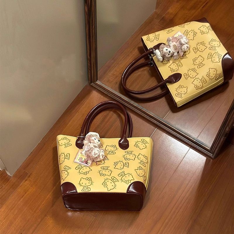 PR Tas tangan tambal sulam Hello Kitty lucu bekas PU tas jinjing komuter serbaguna tas bahu ember u