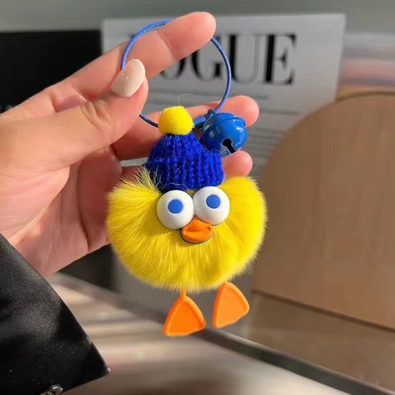 gantungan kunci boneka plush bebek lucu.