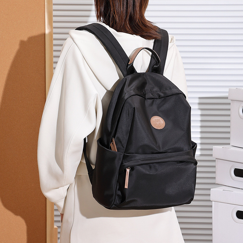 Tas Ransel Wanita  Bagian belakang klasik baru, ringan kapasitas besar perjalanan, versi Korea perja