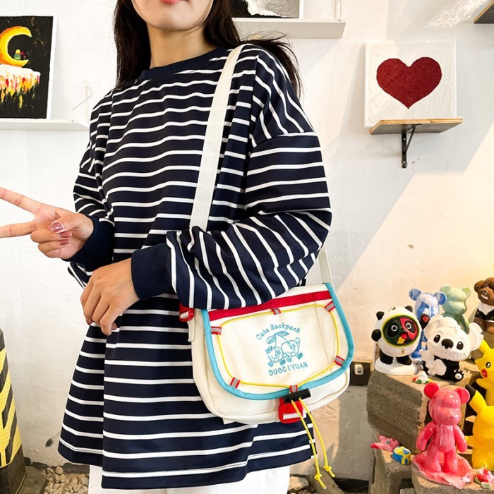 Tas kecil yang lucu untuk wanita tas selempang pelajar perempuan retro kasual serbaguna gaya perguru