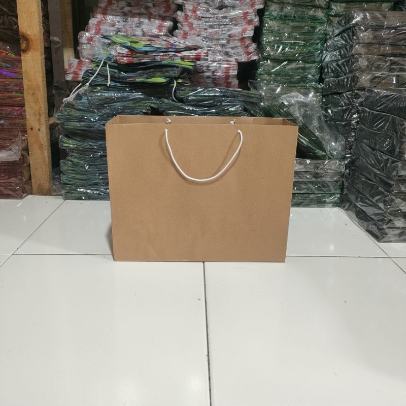

RB Paper Bag Polos Coklat Besar Landscape Tali Kertas/Tali kur Lusinan Isi 12 pcs Ukuran 351328 cm