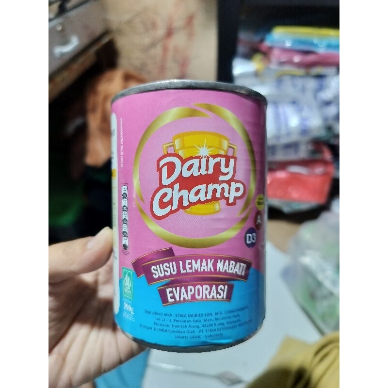 

Dairy Champ susu evaporasi 390g