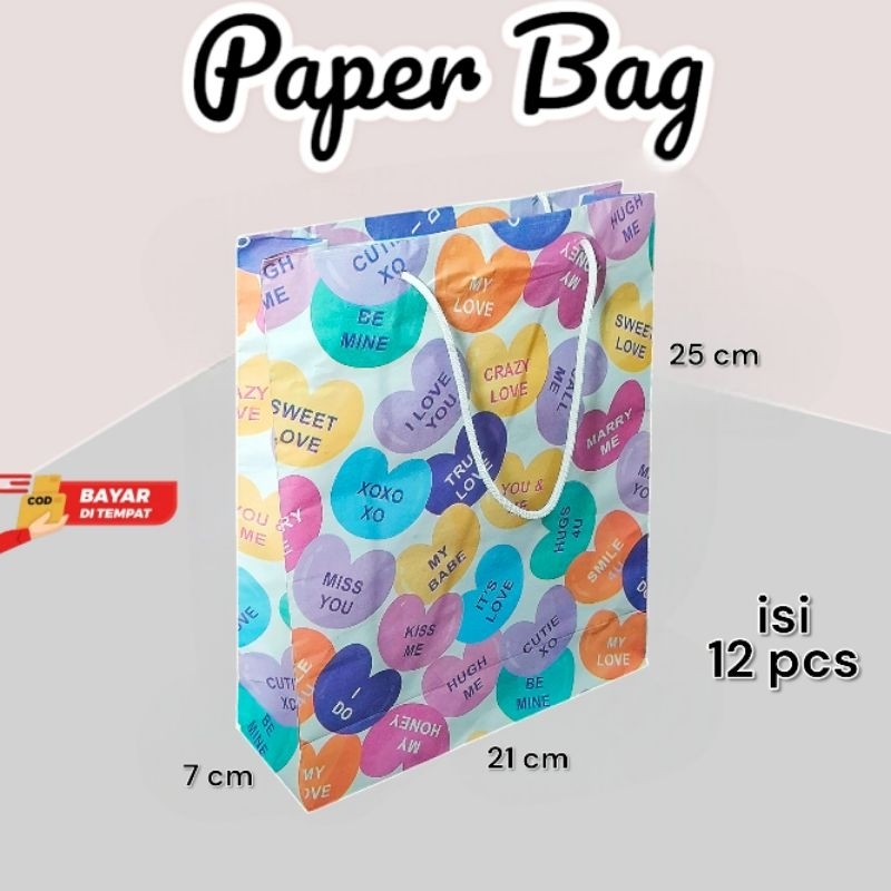 

Paper Bag Kado Motif Marry Me Lusinan Isi 12 pcs Ukuran 21×7×25 cm