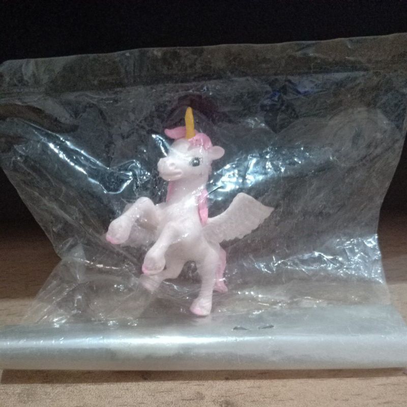 

Hiasan kue kuda poni