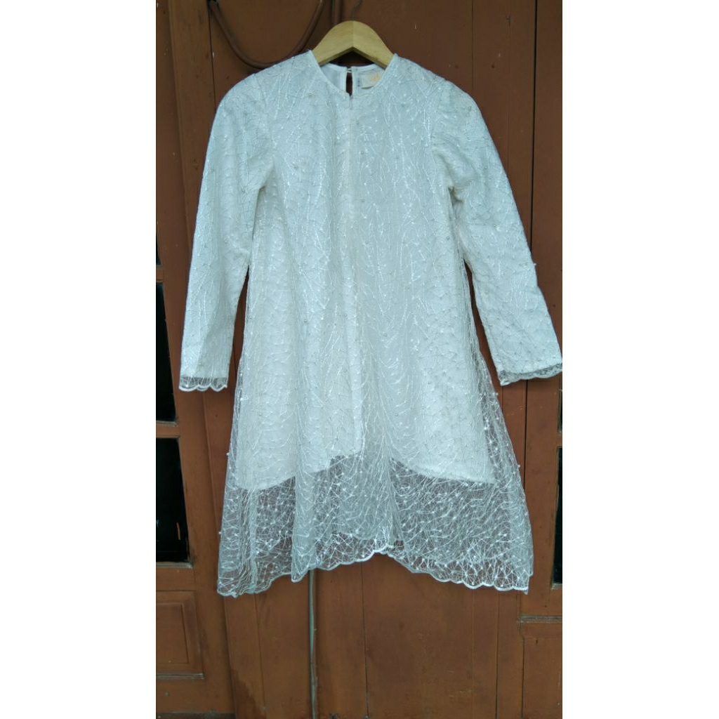 preloved tunik mutiara dari brand pekgo apparel
