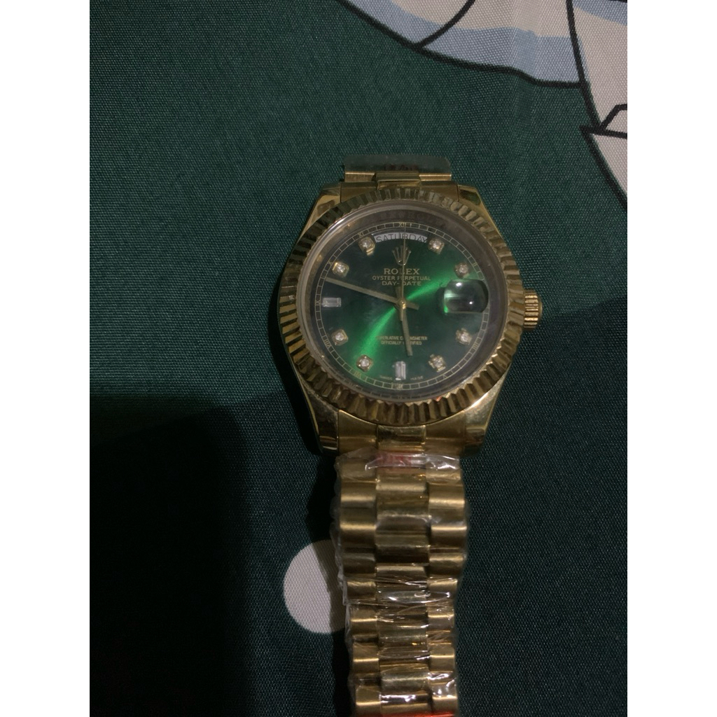 Jam tangan Rolex oyster day date Green Gold