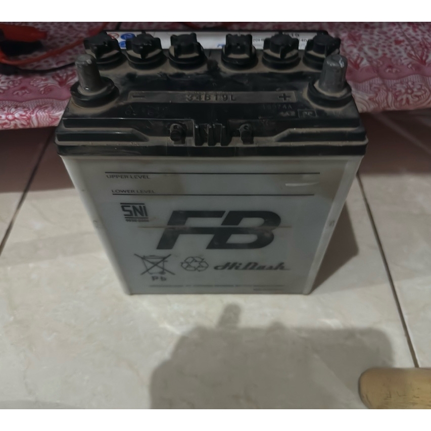 aki basah mobil 12v kondisi bagus bekas