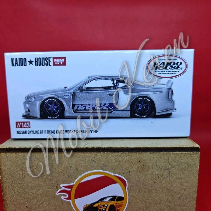 Diecast Mini GT Kaido House 143 Nissan Skyline GT-R (R34) Kaido Works Shinjuku V1 silver ban karet