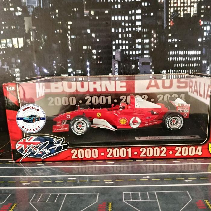 DIECAST F1 FERRARI F2004 MICHAEL SCHUMACHER MELBOURNE AUSTRALIA SKALA 18 BY HOTWHEELS