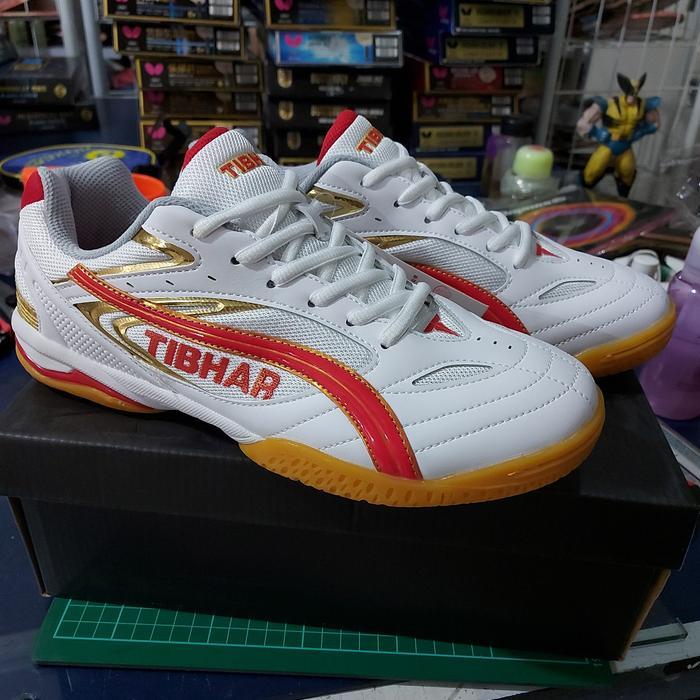sepatu tibhar putih merah emas