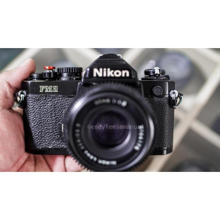 Kamera analog 35mm SLR film Nikon FM2 Black dan nikon E 50mm f1.8 ais