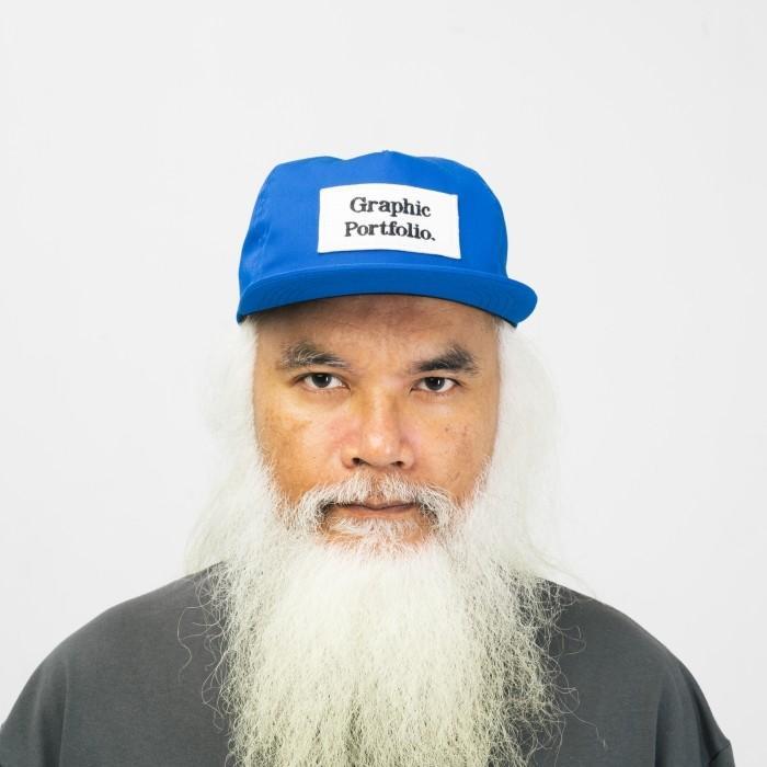 UNKL347 Topi Snap Back Warna Biru APTA