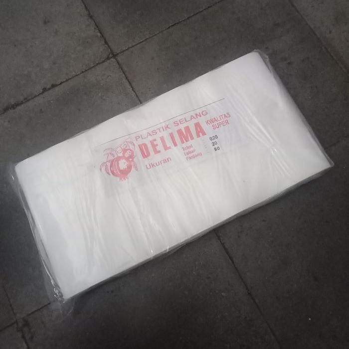 SELANG PLASTIK irigasi 4 inch bening tebal / 50 meter